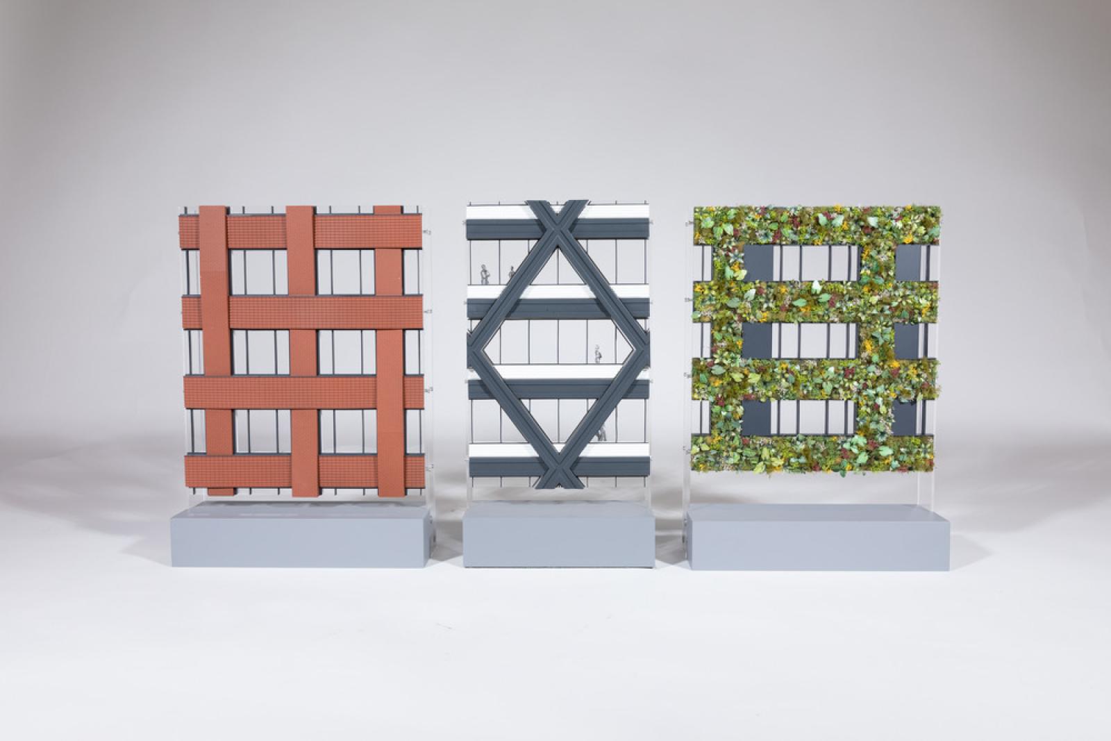 Eden, Three New Bailey, Four New Bailey - 1:50 facade models 

This set of models shows the different facade types of three Make schemes across New Bailey, a vibrant mixed-use masterplan in Salford, Greater Manchester.

Eden – This model shows the living facade at Eden, which is the biggest green wall in Europe, measuring 43,000ft2 and featuring 32 species of evergreen and perennial plants that drastically improve biodiversity across New Bailey. As the plants bloom and change with the seasons, so does the appearance of this office building, creating a dynamic and vibrant facade that’s always evolving.

Three New Bailey – Our red brick weave facade design for this office building references Greater Manchester’s 19th-century warehouse architecture and bold engineered aesthetics. The model demonstrates the different brick bonds across the elevations, which include a smooth stretcher bond for the vertical and stack bond for the horizontal.

Four New Bailey – The black metal diagrid structure of our architecture for this office building, a gateway to the masterplan, echoes the industrial Victorian heritage of the 1870s Irwell Street Bridge. This model shows the bold diagrid form and ceramic spandrels, which reference local ceramic-making traditions.

Laser-cut acrylic, PLA 3D print, spray paint, scale planting

Made by Modelmakers: Alex Stewart, Paul Miles, Susie Cole, Gabe Tansley