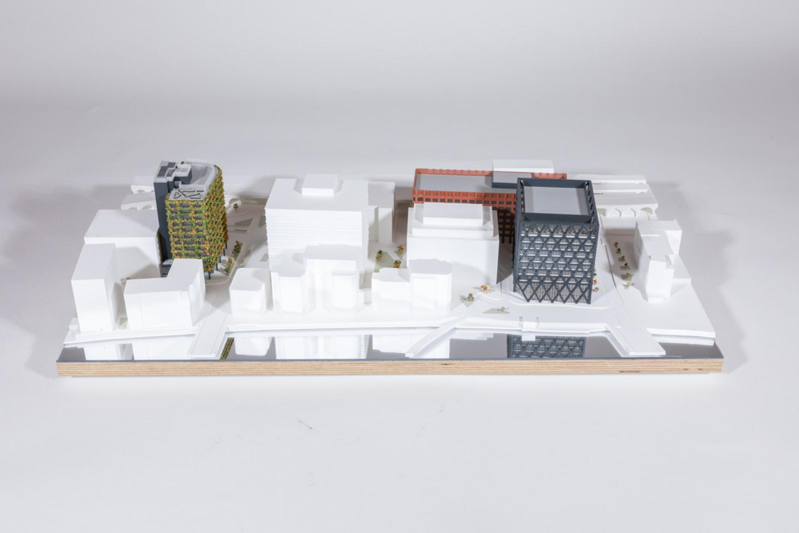 New Bailey Masterplan – 1:500 context model

This model shows Make’s three schemes within the New Bailey Masterplan in Salford, Greater Manchester. It was created to demonstrate the different facades and massing of these buildings, and is used in conjunction with three 1:50 facade models that show these facades in more detail. To highlight our buildings, all of the surrounding buildings are finished in white. 

Laser-cut acrylic, mirrored acrylic, PLA 3D print, SLA 3D print, spray paint, scale planting

Made by Model makers: Alex Stewart, Susie Cole, Paul Miles