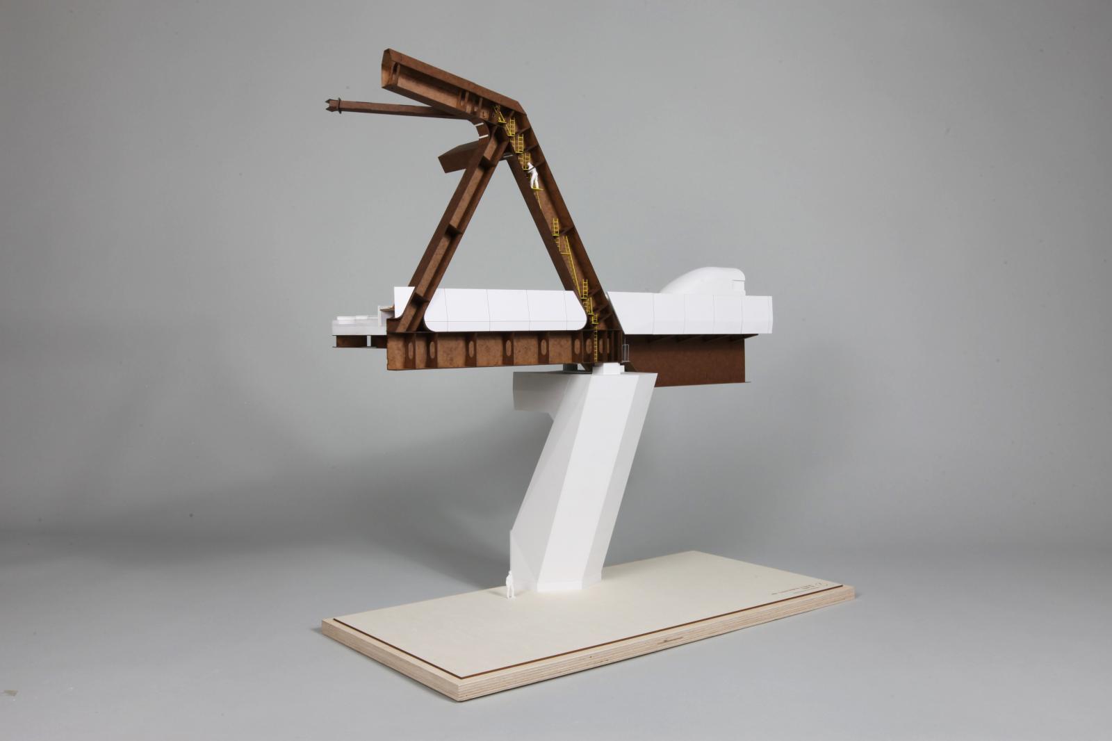 Truss Bridge Model / Scale = 1:50

This model was first used internally by the design team to optioneer different parapet/noise barrier options and how they related to the steel form of the bridge. We also looked at the design of the safety barrier at the top of the pier and entrance hatch into the bottom of the structure. When it had been built we went on to use it to assess the accessibility and safety of the internal maintenance routes, by removing the side panel of the truss. These ladders and platforms were modelled to help illustrate how awkward it would be for an operative to traverse.

Materials: Laser Board, Foam Board, Mount board, PLA Filament, FinnBoard, Plywood Base, Spray Paint. Techniques: Traditional Machining, Laser Cutting, 3D Printing

Makers: Toby Loughton & Felix Burke