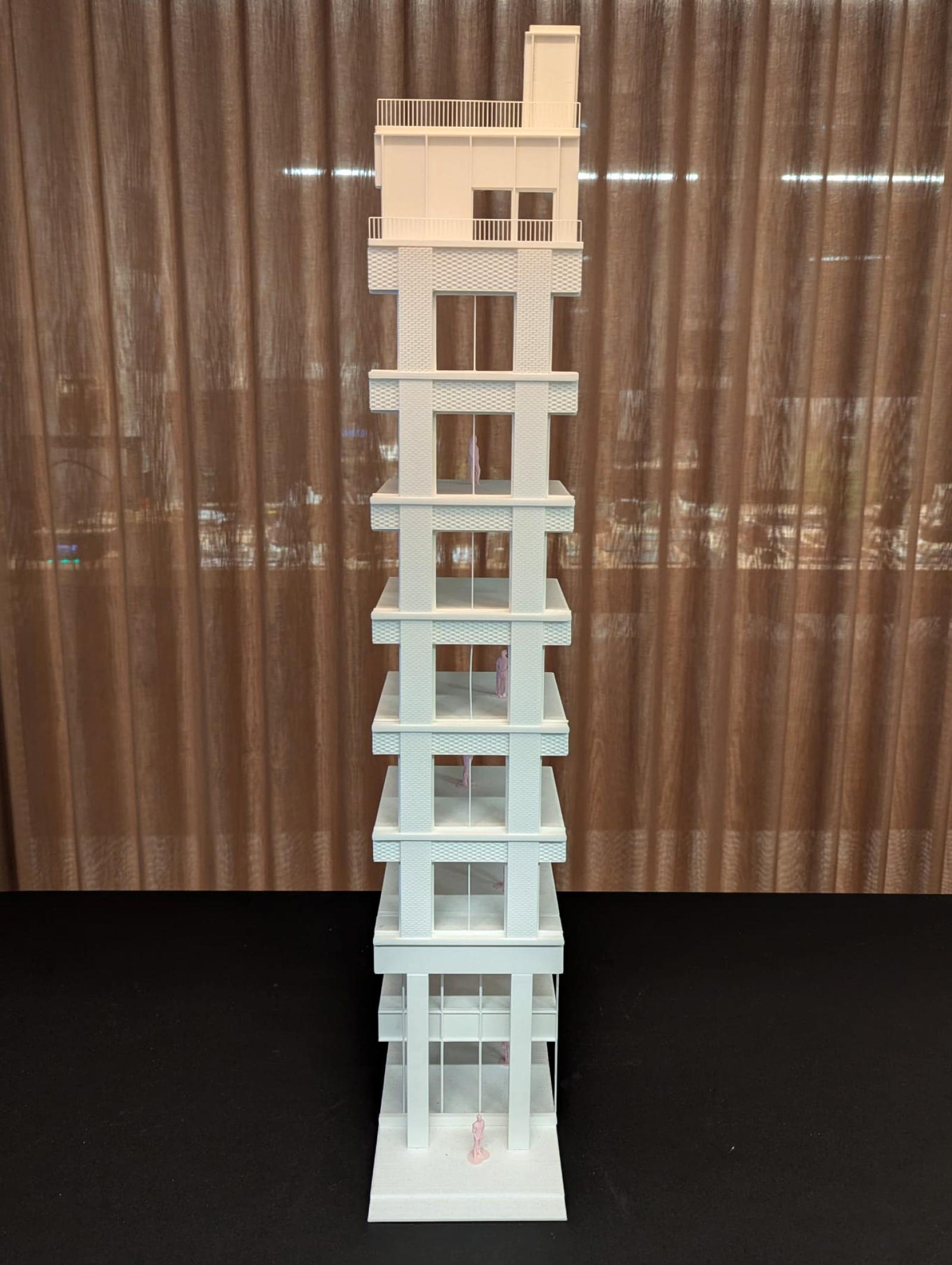 35 Fountain Street, 1:50, Facade Section Study

This model was instrumental in testing the detailed façade proportions of the proposed building, allowing the assembly methodology of the different façade elements to be understood and its elegant vertical rhythm to be examined with greater precision. The increased scale and resolution enable a review of heights, floor-to-floor relationships and façade articulation, while supporting an appreciation of the human scale and spatial qualities of the building. 

The 3D printed model allowed subtle variations in façade treatment to be tested and was particularly effective in understanding the difference in articulation of the first two levels in relation to the upper floors, as well as the relationship between the ground floor and the street.

Alongside informing the overall façade composition, the model allowed the internal experience to be reviewed by providing sections of the floorplates with views through apertures. 

PLA 3D Print

Made by Katy Webb, Architectural Assistant & Sam Gills, Associate