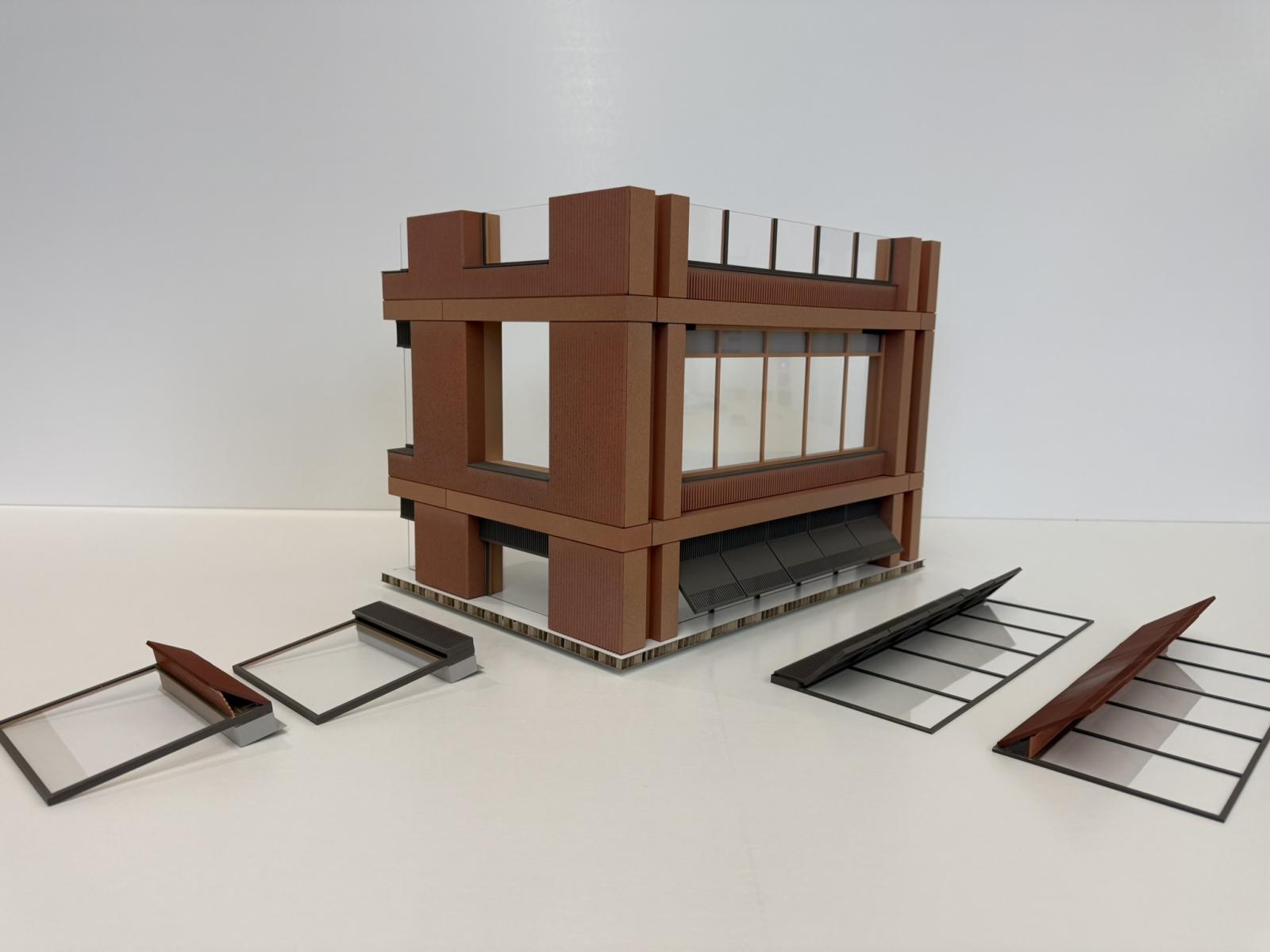 Sister C1 - Facade Study Model / 1:20 / Facade Model

Representing a typical corner condition of Sister C1, the model explores the contrasting conditions of the south and west facades and the transition between the two. The larger scale provides the opportunity to study the finer detailing of the precast facade panels alongside the relationship to the tone and articulation of the glazing system. As a physical object, the model was instrumental in supporting collaborative conversations across the project team.

SLA 3D print, Laser cut acrylic, Spray applied paint finish

Gareth Verbiest - Modelmaker, Heather Whitehead - Modelmaker, David Euinton - Architect, Joe Steel - Architect