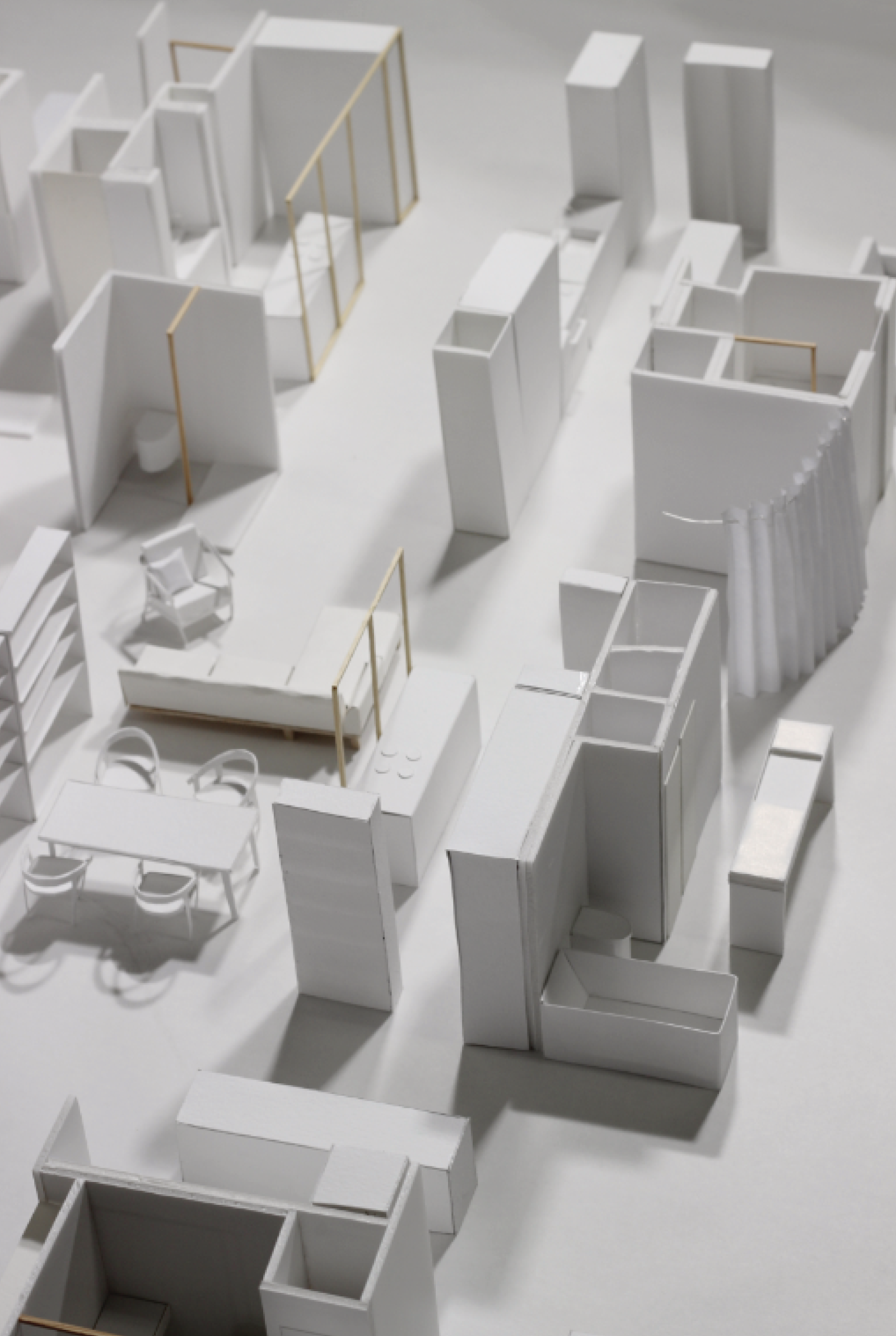 Hackney Wick Bungalow, 1:25, Non-Detailed Layout Studies

Layout tests in no particular order. A field of models of both designed and indicative spaces, illustrative of the often explosive exponential nature of options where a conceptual or physical constraint will allow one variation and not another, for example, sectional option ‘A’ can be applied to ‘C’ but not ‘E’.

Card, Paper, Balsa wood, Mirrored Card

Mark Rist, Natalie Savva, Isaac Lawson (Architectural assistant)